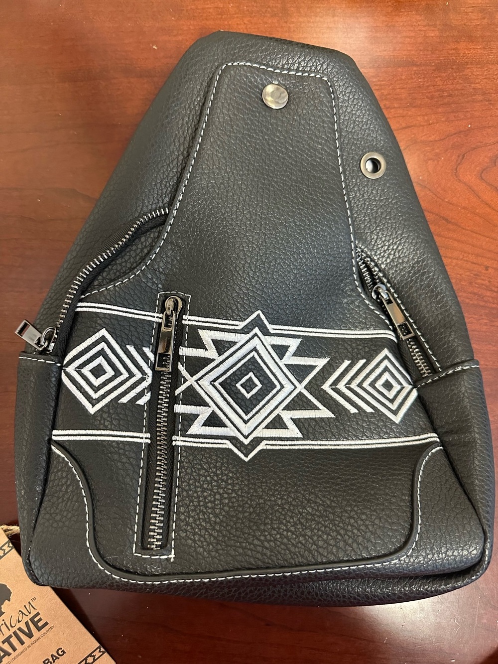Black Embroidered Geometric Sling Backpack - Women's Crossbody